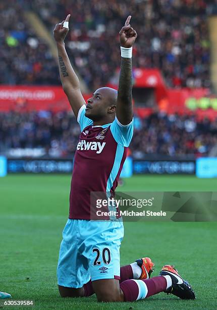 Andre Ayew of West Ham United celebrates scoring the opening goal during the Premier League match between Swansea City and West Ham United at Liberty...