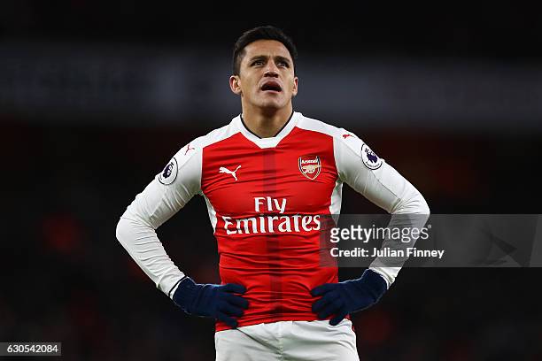 Alexis Sanchez of Arsenal reacts during the Premier League match between Arsenal and West Bromwich Albion at Emirates Stadium on December 26, 2016 in...