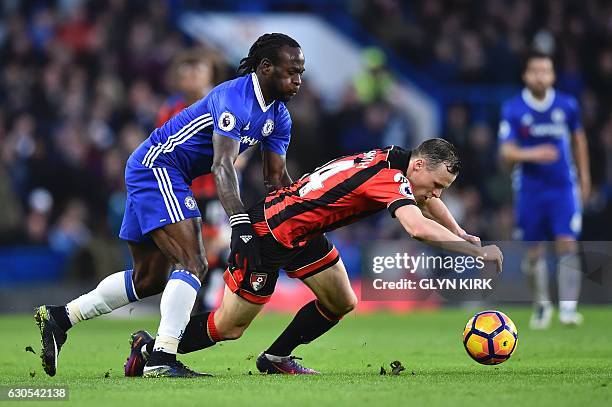 Chelsea's Nigerian midfielder Victor Moses vies with Bournemouth's Australian midfielder Brad Smith during the English Premier League football match...