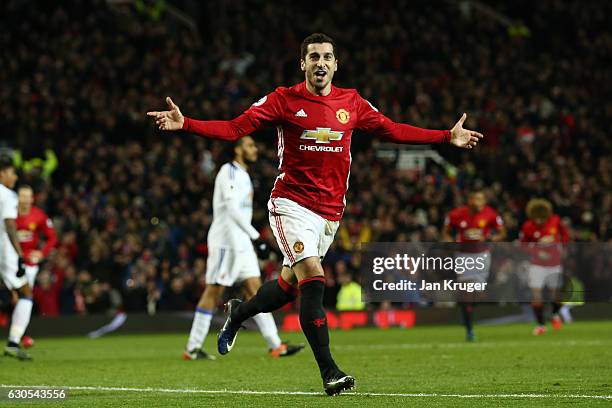 Henrikh Mkhitaryan of Manchester United celebrates after scoring his team's third goal during the Premier League match between Manchester United and...