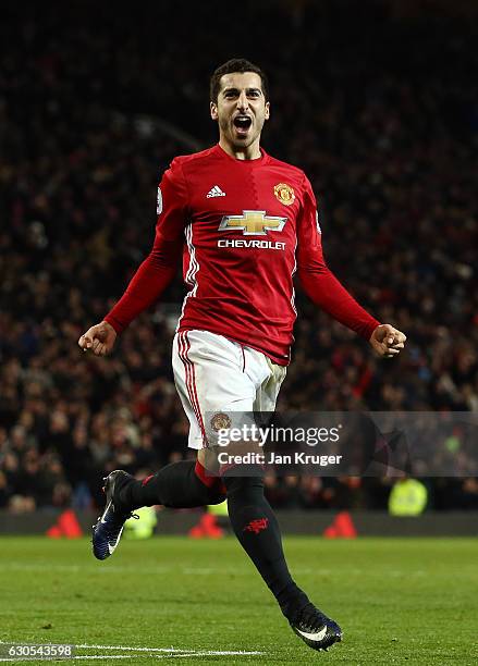 Henrikh Mkhitaryan of Manchester United celebrates after scoring his team's third goal during the Premier League match between Manchester United and...