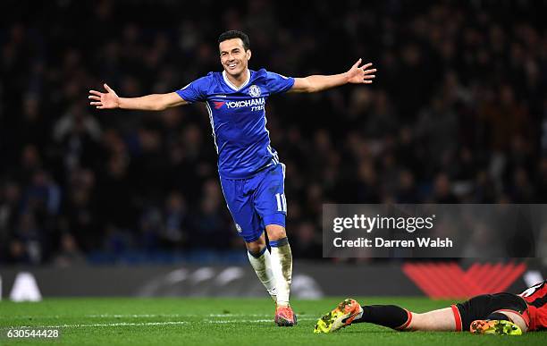 Pedro of Chelsea celebrates after scoring his second and his sides third goal during the Premier League match between Chelsea and AFC Bournemouth at...