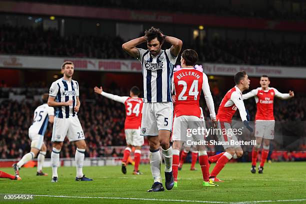 Claudio Yacob of West Bromwich Albion reacts to a missed opportunity during the Premier League match between Arsenal and West Bromwich Albion at...