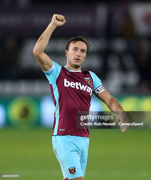 West Ham United's Mark Noble celebrates at the end of the game during the Premier League match between Swansea City and West Ham United at Liberty...