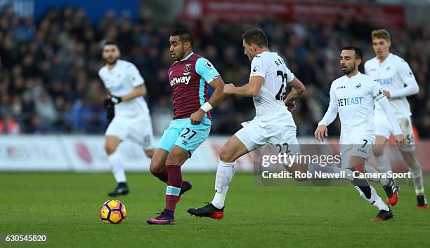 West Ham United's Dimitri Payet goes past Swansea City's Angel Rangel during the Premier League match between Swansea City and West Ham United at...