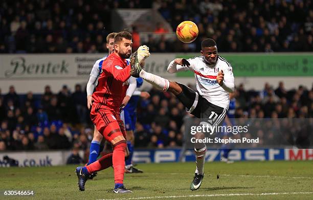 Bartosz Bialkowski of Ipswich Town and Floyd Ayite of Fulham compete for the ball during the Sky Bet Championship match between Ipswich Town and...