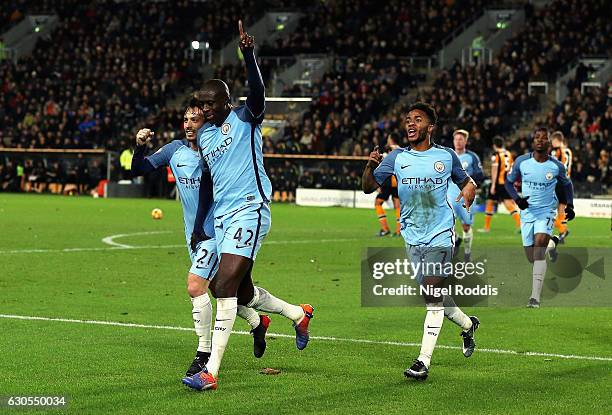 Yaya Toure of Manchester City celebrates scoring the opening goal with David Silva during the Premier League match between Hull City and Manchester...