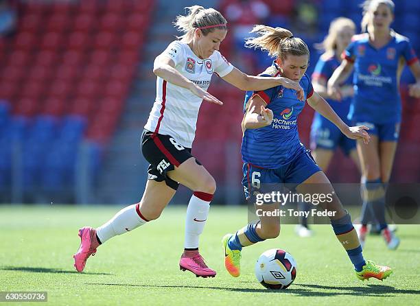 Erica Halloway of the Wanderers contests the ball with Cassidy Davis of the Jets during the round eight W-League match between Newcastle and Western...