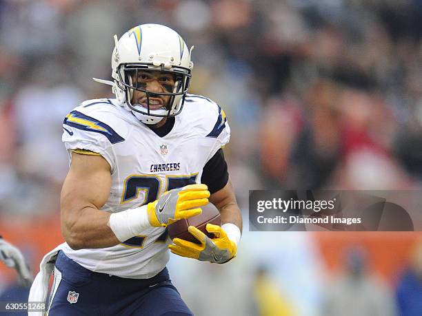 Running back Kenneth Farrow of the San Diego Chargers carries the ball downfield during a game against the Cleveland Browns on December 24, 2016 at...