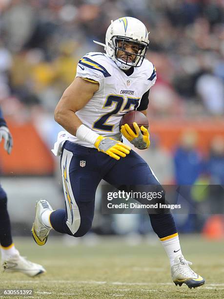 Running back Kenneth Farrow of the San Diego Chargers carries the ball downfield during a game against the Cleveland Browns on December 24, 2016 at...