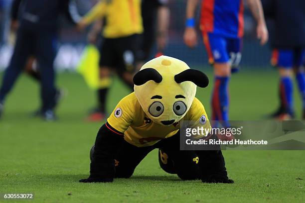 Watford mascot Harry the Hornet dives on the floor at the final whistle mocking Wilfred Zaha of Palace during the Premier League match between...