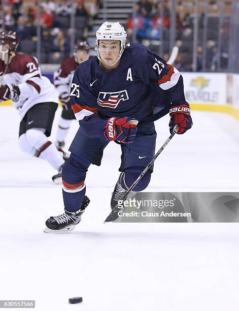 Charlie McAvoy of Team USA chases after a puck against Team Latvia during a 2017 IIHF World Junior Hockey Championship game at the Air Canada Centre...