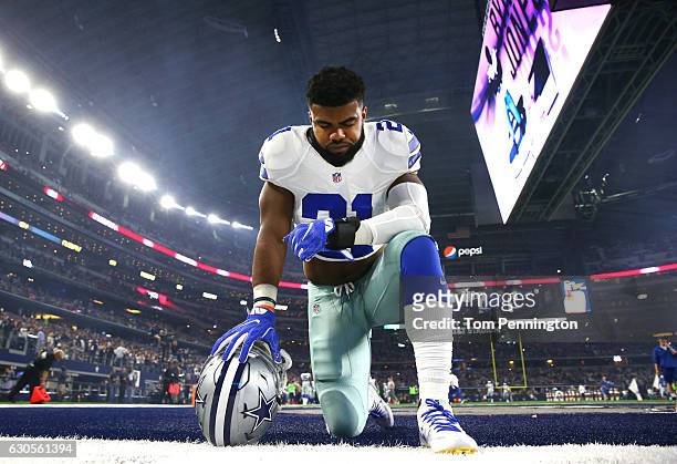 Ezekiel Elliott of the Dallas Cowboys takes a knee in the end zone before the Cowboys played the Detroit Lions at AT&T Stadium on December 26, 2016...