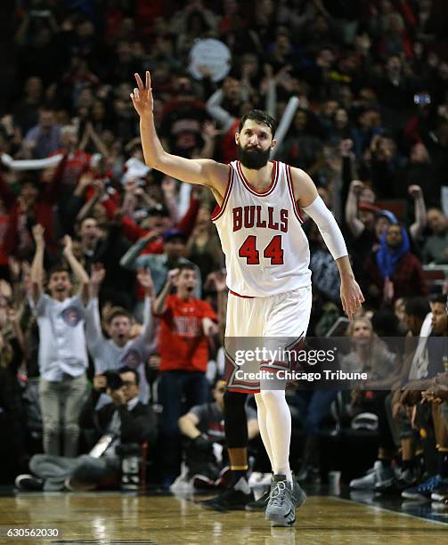 Chicago Bulls forward Nikola Mirotic celebrates his two points during the final seconds of their game against the Indiana Pacers at the United Center...