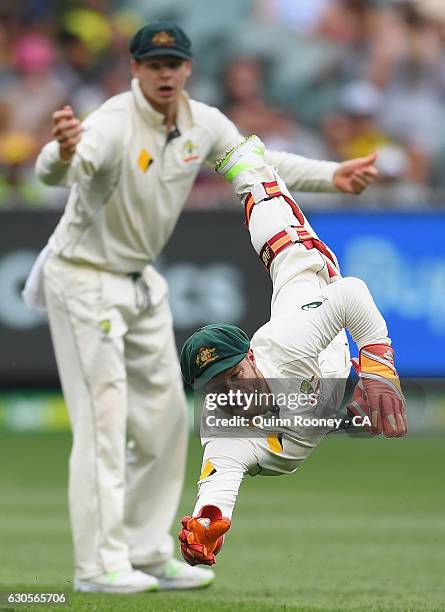 Matthew Wade of Australia dives in an effort to take a catch during day two of the Second Test match between Australia and Pakistan at Melbourne...