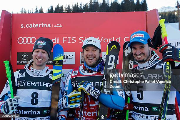Hannes Reichelt of Austria takes 2nd place, Kjetil Jansrud of Norway takes 1st place, Dominik Paris of Italy takes 3rd place during the Audi FIS...