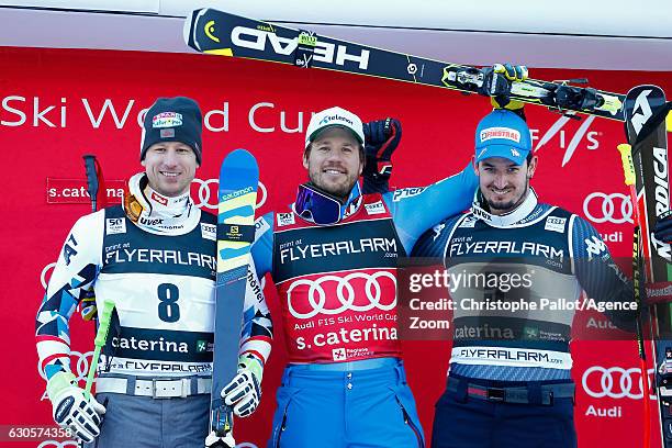 Hannes Reichelt of Austria takes 2nd place, Kjetil Jansrud of Norway takes 1st place, Dominik Paris of Italy takes 3rd place during the Audi FIS...