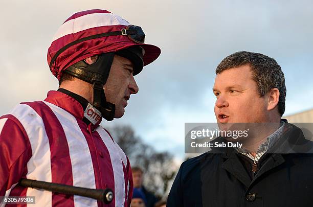 Dublin , Ireland - 27 December 2016; Jockey Davy Russell, left, with trainer Gordon Elliot after winning the Paddy Power Steeplechase with Noble...