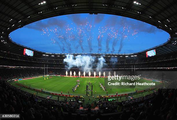 Pyrotechnics explode as the teams run onto the pitch prior to the Aviva Premiership Big Game 9 match between Harlequins and Gloucester Rugby at...