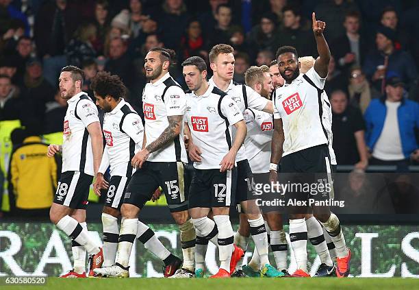 Darren Bent of Derby County celebrates after he scores his sides first goal from the penalty spot during the Sky Bet Championship match between Derby...