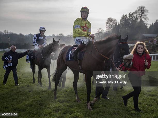 Horses are led back to the parade ring following the second race during the 2016 Coral Welsh Grand National at Chepstow Racecourse on December 27,...