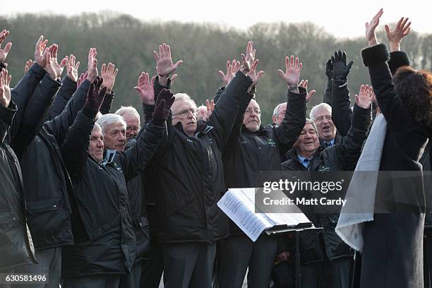 Welsh male choir entertains the crowd ahead of the first race during the 2016 Coral Welsh Grand National at Chepstow Racecourse on December 27, 2016...