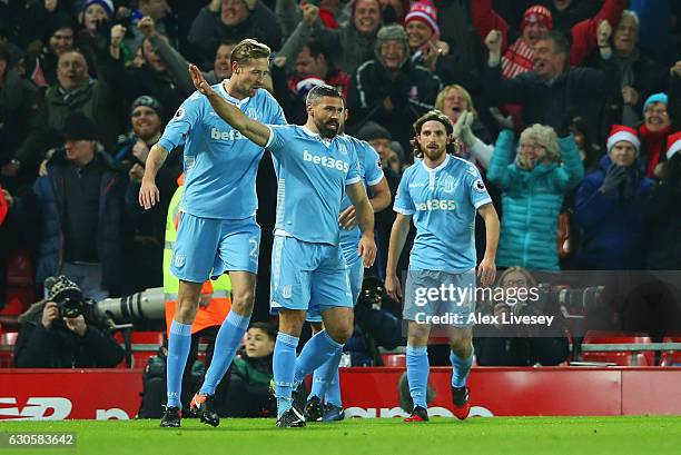 Jonathan Walters of Stoke City celebrates with team mates as he scores their first goal during the Premier League match between Liverpool and Stoke...