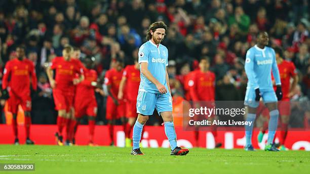 Joe Allen of Stoke City looks dejected as Gianelli Imbula of Stoke City scores an own goal for Liverpool's third during the Premier League match...