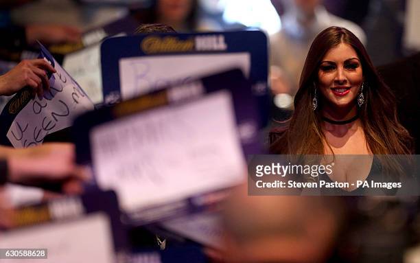 Oche girl during the walk on during day ten of the William Hill World Darts Championship at Alexandra Palace, London.