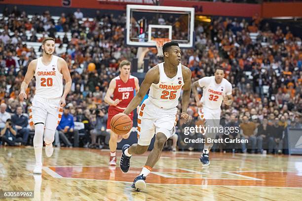 Tyus Battle of the Syracuse Orange dribbles downcourt during the first half against the Cornell Big Red on December 27, 2016 at The Carrier Dome in...