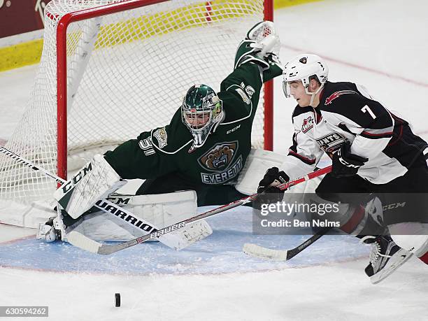 Ty Ronning of the Vancouver Giants is stopped by goaltender Mario Petit of the Everett Silvertips during the second period of their WHL game at the...