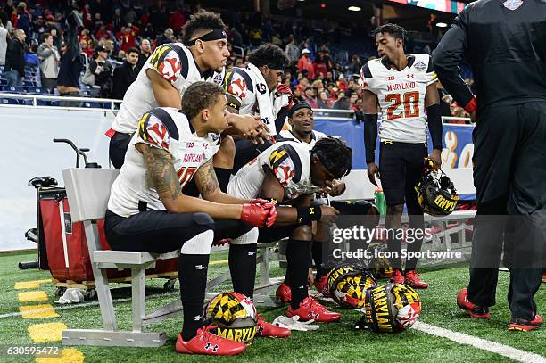 Terrapins players watch in dejection as the final seconds tick away during the Quick Lane Bowl between Maryland and Boston College on December 26 at...