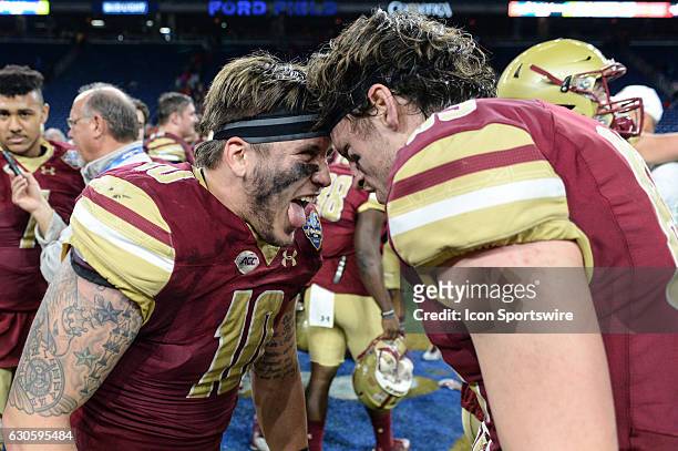 Eagles linebacker Ty Schwab celebrates victory following the Quick Lane Bowl between Maryland and Boston College on December 26 at Ford Field in...