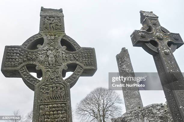 View of the historic ruins of Monasterboice, with Muiredach's Cross , one of the finest high crosses in Ireland, and the round tower, an early...