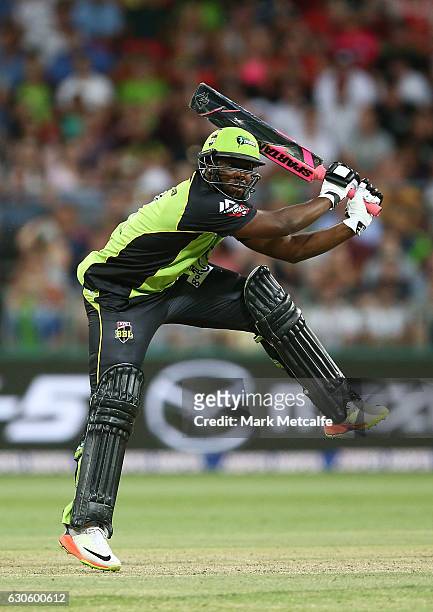 Andre Russell of the Thunder bats during the Big Bash League match between the Sydney Thunder and Brisbane Heat at Spotless Stadium on December 28,...