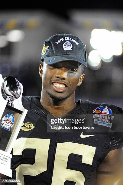 Wake Forest Demon Deacons linebacker Thomas Brown celebrates being named the Military Bowl MVP on December 27 at Navy - Marine Corps Memorial Stadium...