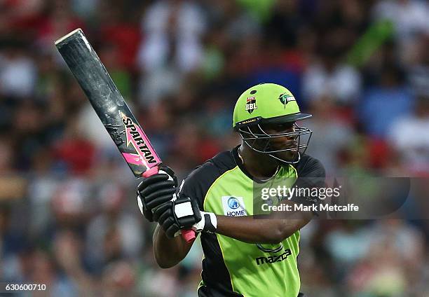 Andre Russell of the Thunder bats during the Big Bash League match between the Sydney Thunder and Brisbane Heat at Spotless Stadium on December 28,...