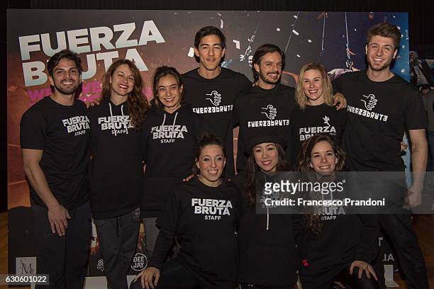 Entire Staff of Fuerza Bruta Show attends a photocall at Teatro Linear Ciak In Milan on December 27, 2016 in Milan, Italy.