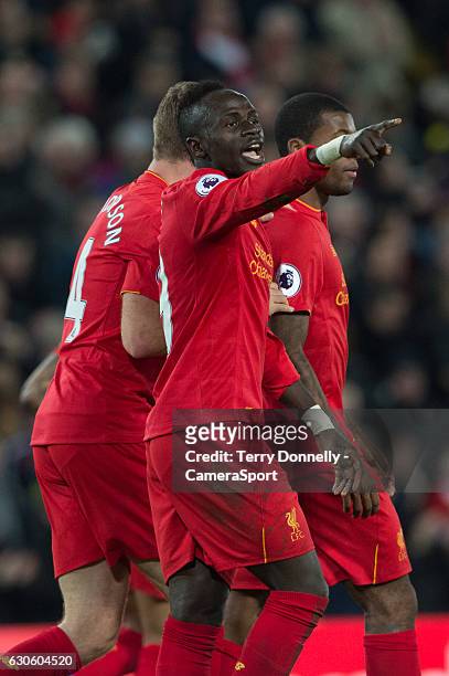 Liverpool's Sadio Mane celebrates scoring Liverpools third goal during the Premier League match between Liverpool and Stoke City at Anfield on...