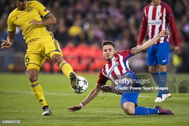 Saul Niguez Esclapez of Atletico de Madrid competes for the ball with Christian Noboa of FC Rostov during their 2016-17 UEFA Champions League match...