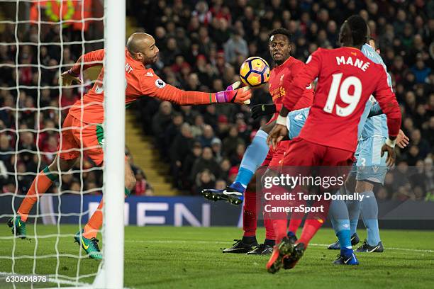 Stoke City's goalkeeper Lee Grant saves a shot from Liverpool's Divock Origi during the Premier League match between Liverpool and Stoke City at...