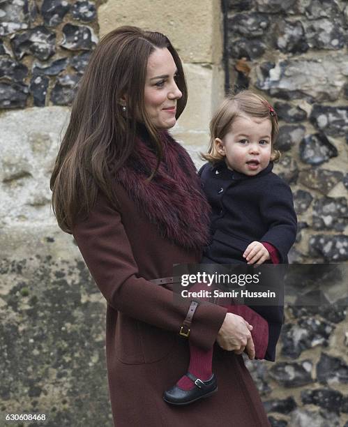 Catherine, Duchess of Cambridge and Princess Charlotte of Cambridge attend Church on Christmas Day on December 25, 2016 in Bucklebury, Berkshire.