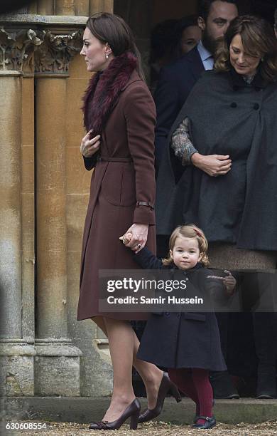 Catherine, Duchess of Cambridge and Princess Charlotte of Cambridge attend Church on Christmas Day on December 25, 2016 in Bucklebury, Berkshire.