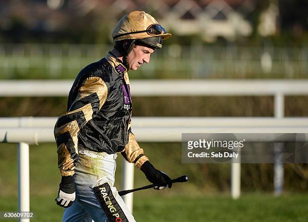 Dublin , Ireland - 28 December 2016; Patrick Mullins returns to the padock after falling from Shaneshill at the last hurdle during the Squared...