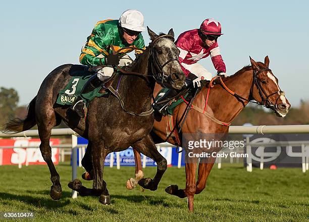 Dublin , Ireland - 28 December 2016; Eventual winner Bleu Et Rouge, left, with Barry Geraghty up, races ahead of Gangster, with Bryan Cooper up, on...