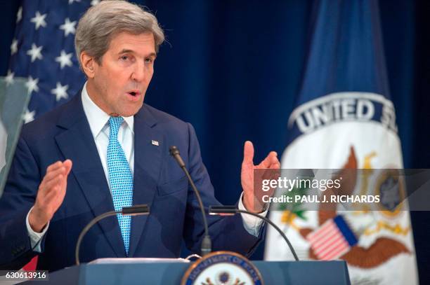 Secretary of State John Kerry delivers remarks on the Middle East December 28 in the Dean Acheson Auditorium at the Department of State in...