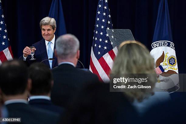 Secretary of State John Kerry takes the podium before delivering a speech on Middle East peace at The U.S. Department of State on December 28, 2016...