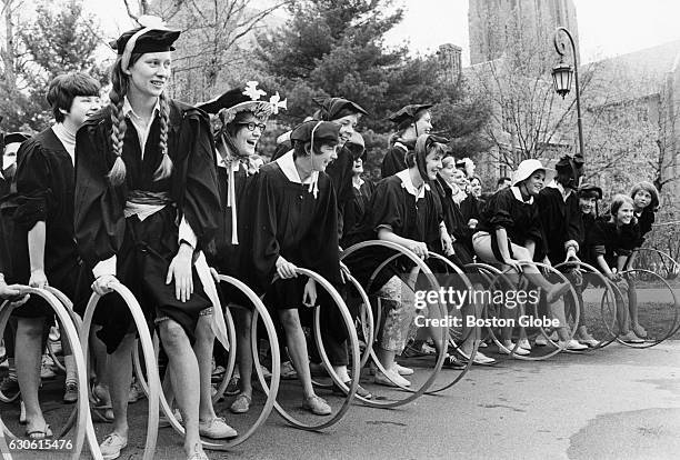 Seniors line up at the starting line of the annual hoop rolling contest at Wellesley College in Wellesley, Mass., on May 4, 1968. The college has...