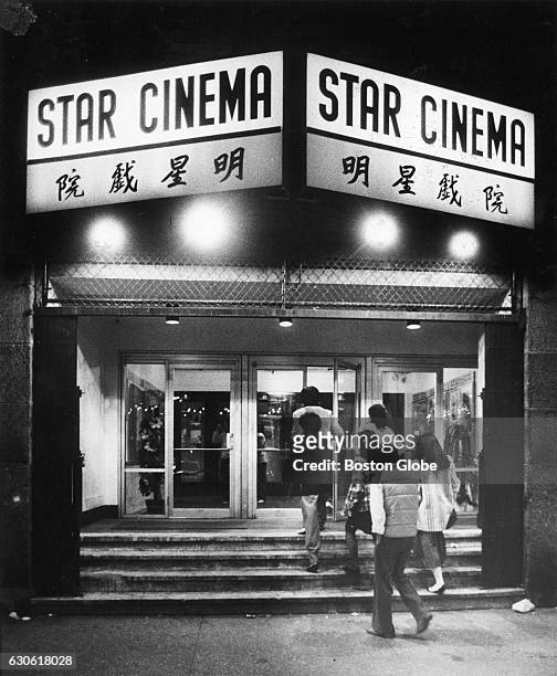 Patrons enter twin-screened Star Cinema on Essex Street in Boston's Chinatown on Dec. 27, 1982. It is one of Boston's Chinese language theaters.