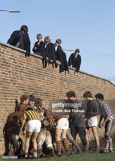 Pupils watching the Eton Wall Game at Eton Public School on 24th November 1984.